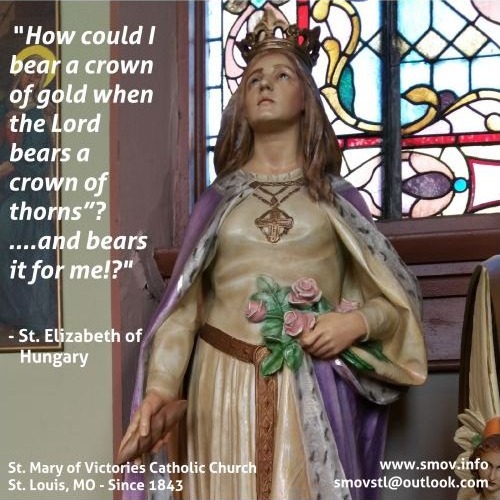 Saint Elizabeth of Hungary statue at Saint Mary of Victories with her reflection on the crown of thorns